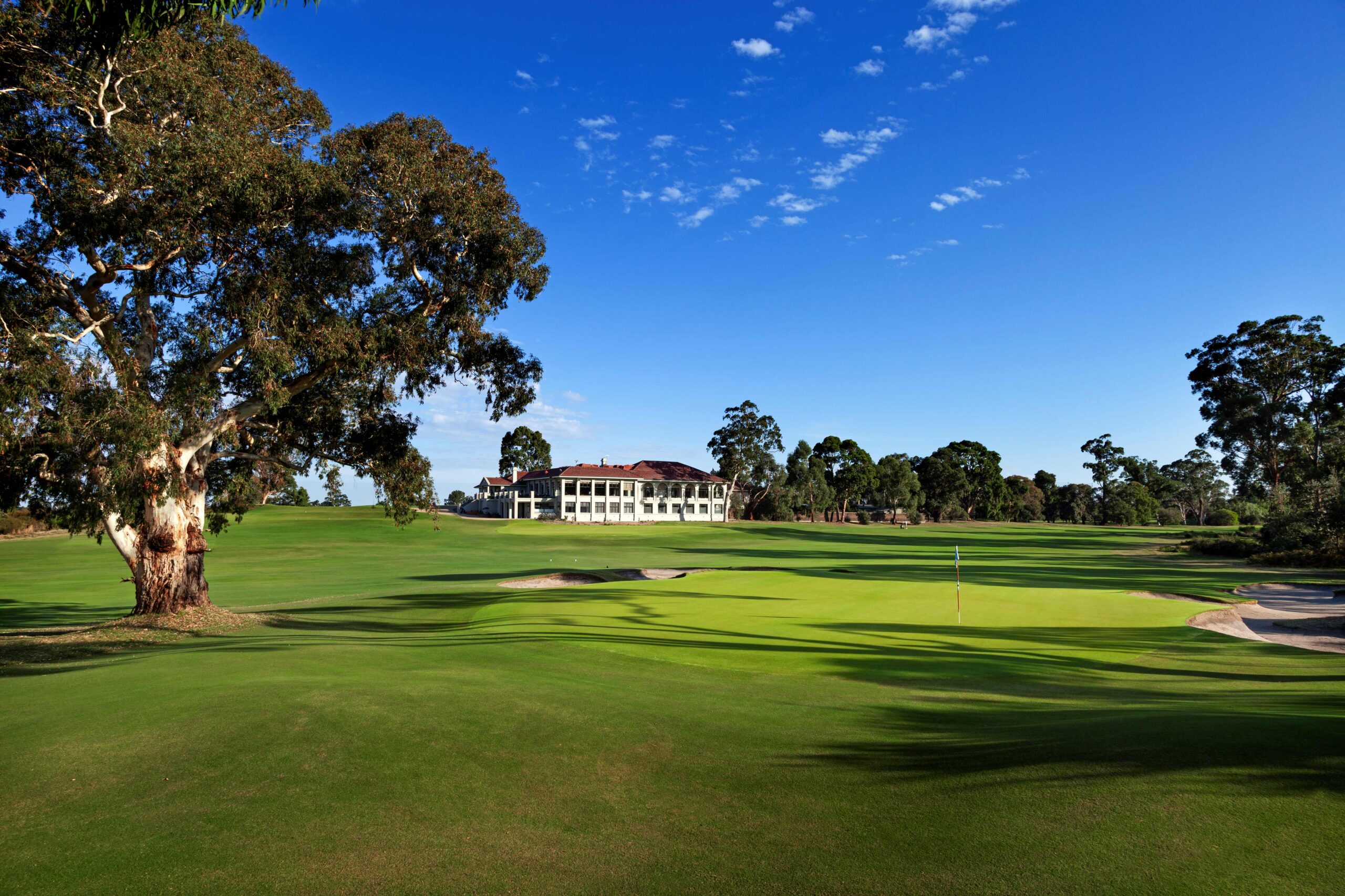 The course and clubhouse at Commonwealth Golf Club